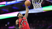 Mar 30, 2025; Philadelphia, Pennsylvania, USA; Toronto Raptors guard RJ Barrett (9) dunks the ball against the Philadelphia 76ers during the fourth quarter at Wells Fargo Center. Mandatory Credit: Bill Streicher-Imagn Images