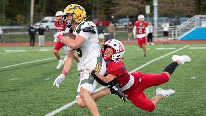 King Philip Regional senior captain Brooks McDonald (5) runs the ball in a game against Natick on Oct. 3. King Philip Regional senior captain Brooks McDonald (5) runs the ball in a game against Natick on Oct. 3.