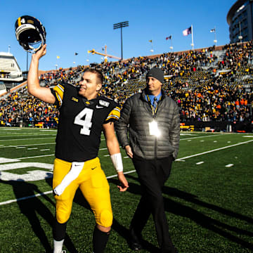 Iowa quarterback Nate Stanley (4) waves to fans after doing an interview after a NCAA Big Ten Conference football game, Saturday, Nov. 23, 2019, at Kinnick Stadium in Iowa City, Iowa.

191123 Illinois Iowa Fb 004 Jpg