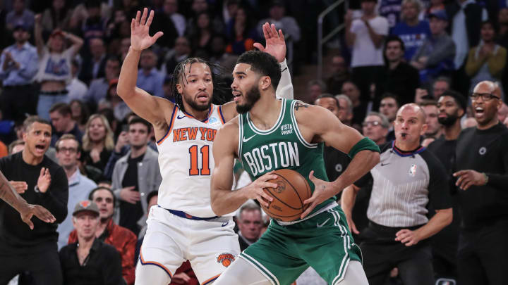 Oct 25, 2023; New York, New York, USA; Boston Celtics forward Jayson Tatum (0) is guarded by New York Knicks guard Jalen Brunson (11) while trying to make a pass in the fourth quarter at Madison Square Garden. Mandatory Credit: Wendell Cruz-USA TODAY Sports