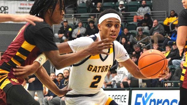 Jeremiah Harshman drives against Central Catholic in the Les Schwab Invitational third place game. 