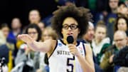Notre Dame guard Miles addresses the crowd after winning the second round of the NCAA Women's Basketball Tournament against Michigan at Purcell Pavilion.