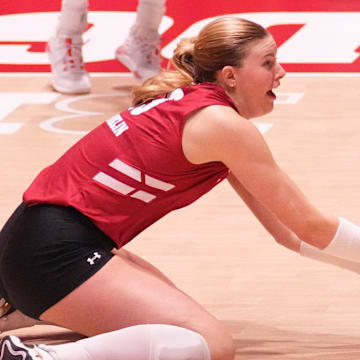 Wisconsin's Sarah Franklin (13) dives for a save during the match against Michigan State on Saturday, November 30, 2024 at the UW Field House in Madison, Wisconsin.