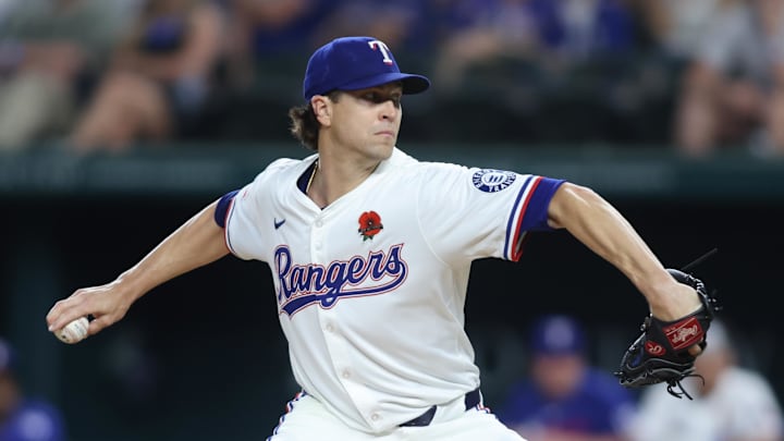 Texas Rangers pitcher Jacob deGrom throws a pitch during a game.