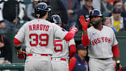 Apr 29, 2022; Baltimore, Maryland, USA; Boston Red Sox designated hitter Christian Arroyo (39) greeted by outfielder Jackie Bradley Jr. (19) after his two run home run in the second inning against the Baltimore Orioles at Oriole Park at Camden Yards.