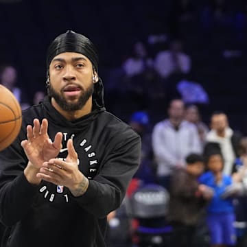 Apr 3, 2025; Brooklyn, New York, USA; Brooklyn Nets power forward Trendon Watford (9) warms up prior to the game against the Minnesota Timberwolves at Barclays Center. Mandatory Credit: Gregory Fisher-Imagn Images