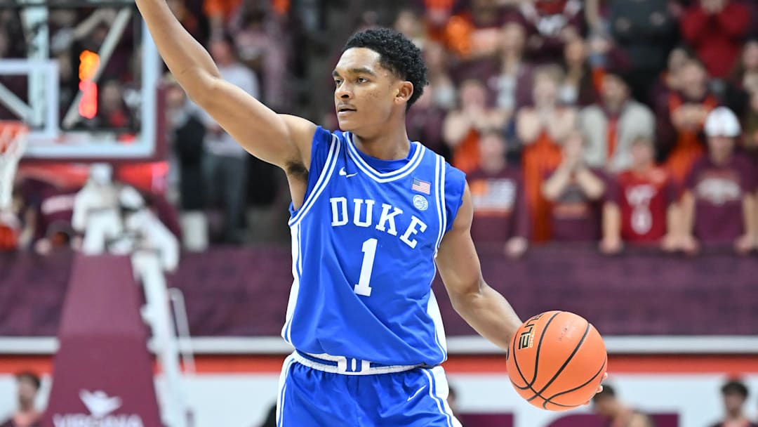 Jan 31, 2026; Blacksburg, Virginia, USA;  Duke Blue Devils guard Caleb Foster (1) calls the play during the first half at Cassell Coliseum. Mandatory Credit: Brian Bishop-Imagn Images