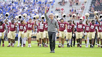 Sep 14, 2024; Tallahassee, Florida, USA; Florida State Seminoles head coach Mike Norvell leads his team before a game against the Memphis Tigers at Doak S. Campbell Stadium. Mandatory Credit: Melina Myers-Imagn Images