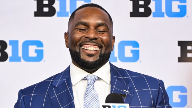 Michigan Wolverines head coach Sherrone Moore speaks to the media during the Big 10 football media day at Lucas Oil Stadium.