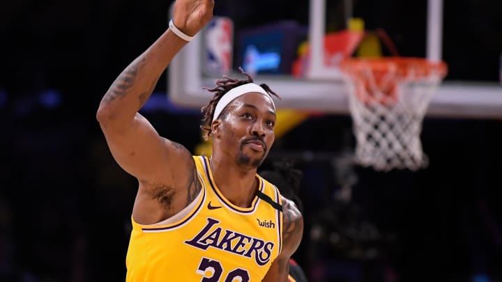 Jan 13, 2020; Los Angeles, California, USA;  Los Angeles Lakers center Dwight Howard (39) celebrates hitting a three-point shot during the fourth quarter against the Cleveland Cavaliers at Staples Center. Howard had 21 points and 15 rebounds off the bench as the Lakers won 128-99. Mandatory Credit: Robert Hanashiro-USA TODAY Sports