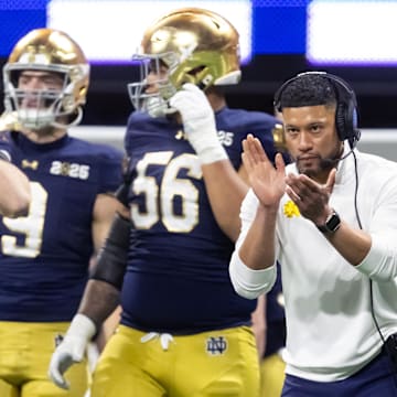 Jan 20, 2025; Atlanta, GA, USA; Notre Dame Fighting Irish head coach Marcus Freeman against the Ohio State Buckeyes during the CFP National Championship college football game at Mercedes-Benz Stadium. 