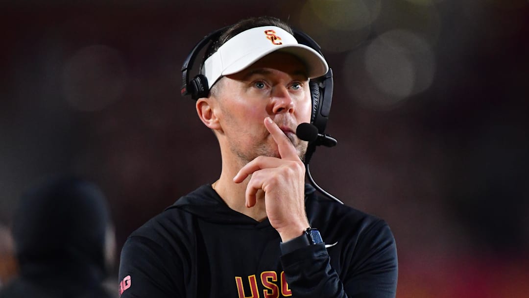 Nov 7, 2025; Los Angeles, California, USA; Southern California Trojans head coach Lincoln Riley watches game action against the Northwestern Wildcats during the second half at the Los Angeles Memorial Coliseum. Mandatory Credit: Gary A. Vasquez-Imagn Images