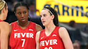 Jun 19, 2025; San Francisco, California, USA; Indiana Fever guard Caitlin Clark (22) talks to guard Lexie Hull (left) and forward Aliyah Boston (7) during the third quarter against the Golden State Valkyries at Chase Center. Mandatory Credit: Darren Yamashita-Imagn Images