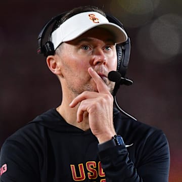 Nov 7, 2025; Los Angeles, California, USA; Southern California Trojans head coach Lincoln Riley watches game action against the Northwestern Wildcats during the second half at the Los Angeles Memorial Coliseum. Mandatory Credit: Gary A. Vasquez-Imagn Images
