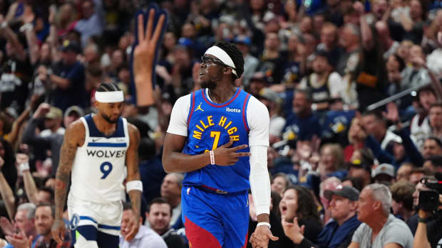 Denver Nuggets guard Reggie Jackson (7) celebrates his three-point basket vs. the Minnesota Timberwolves.