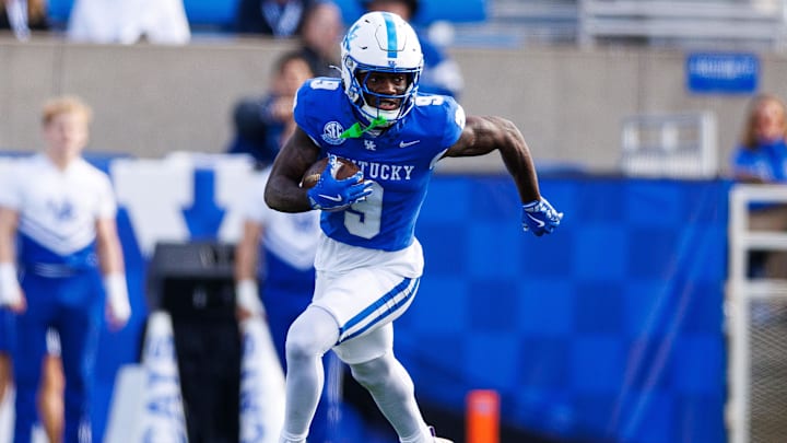 Nov 16, 2024; Lexington, Kentucky, USA; Kentucky Wildcats wide receiver Ja'Mori Maclin (9) runs the ball during the first quarter against the Murray State Racers at Kroger Field. Mandatory Credit: Jordan Prather-Imagn Images