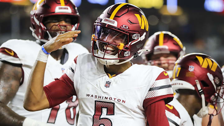 Washington Commanders quarterback Jayden Daniels reacts after scoring a touchdown against the Cincinnati Bengals in the first half of Monday night's game at Paycor Stadium. Washington Commanders quarterback Jayden Daniels reacts after scoring a touchdown against the Cincinnati Bengals in the first half of Monday night's game at Paycor Stadium.