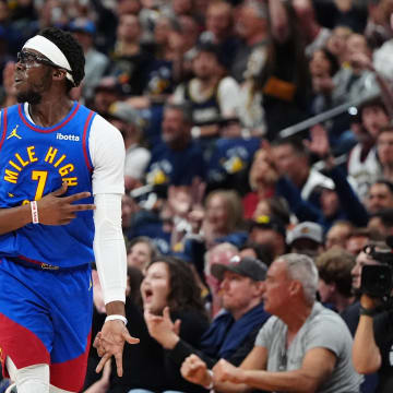 May 4, 2024; Denver, Colorado, USA; Denver Nuggets guard Reggie Jackson (7) celebrates his three-point basket in the second quarter against the Minnesota Timberwolves during game one of the second round for the 2024 NBA playoffs at Ball Arena. Mandatory Credit: Ron Chenoy-USA TODAY Sports