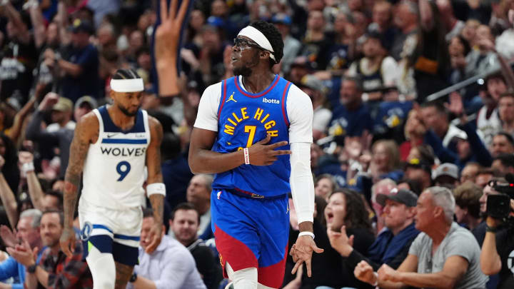 May 4, 2024; Denver, Colorado, USA; Denver Nuggets guard Reggie Jackson (7) celebrates his three-point basket in the second quarter against the Minnesota Timberwolves during game one of the second round for the 2024 NBA playoffs at Ball Arena. Mandatory Credit: Ron Chenoy-USA TODAY Sports