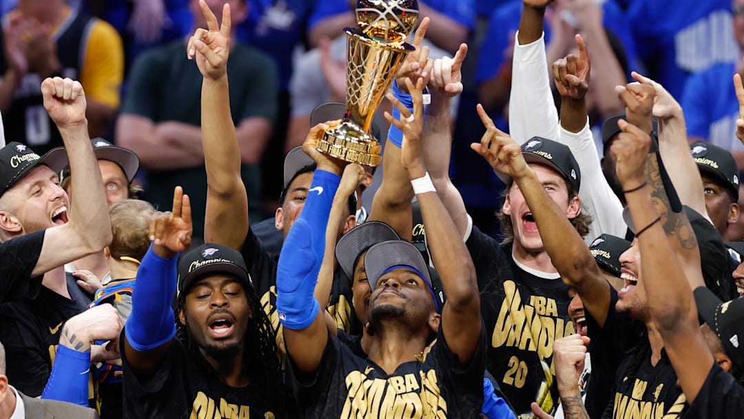 Jun 22, 2025; Oklahoma City, Oklahoma, USA; The Oklahoma City Thunder celebrate after winning game seven of the 2025 NBA Finals against the Indiana Pacers at Paycom Center. Mandatory Credit: Alonzo Adams-Imagn Images Jun 22, 2025; Oklahoma City, Oklahoma, USA; The Oklahoma City Thunder celebrate after winning game seven of the 2025 NBA Finals against the Indiana Pacers at Paycom Center. Mandatory Credit: Alonzo Adams-Imagn Images