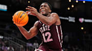 Mississippi State Bulldogs guard Josh Hubbard (12) shoots a layup against the Kansas State Wildcats during the second half of the game at T-Mobile Center.
