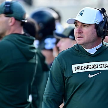 Nov 2, 2024; East Lansing, Michigan, USA;  Michigan State Spartans head coach Jonathan Smith looks over his sidelines during the first quarter against the Indiana Hoosiers at Spartan Stadium. Mandatory Credit: Dale Young-Imagn Images