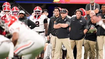 Dec 6, 2025; Atlanta, GA, USA; Georgia Bulldogs head coach Kirby Smart looks on during the first quarter against the Alabama Crimson Tide during the 2025 SEC Championship game at Mercedes-Benz Stadium. Mandatory Credit: Dale Zanine-Imagn Images