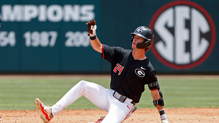 Georgia's Charlie Condon (24) slides into second base during a NCAA Athens Regional baseball game against Army in Athens, Ga., on Friday, May 31, 2024. Georgia won 8-7.