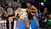 Mar 21, 2025; Milwaukee, WI, USA: Illinois Fighting Illini forward Will Riley (7) drives to the hoop past Xavier Musketeers guard Marcus Foster (1) during the first half at Fiserv Forum. Mandatory Credit: Benny Sieu-Imagn Images