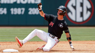 Georgia's Charlie Condon (24) slides into second base during a NCAA Athens Regional baseball game against Army in Athens, Ga., on Friday, May 31, 2024. Georgia won 8-7.