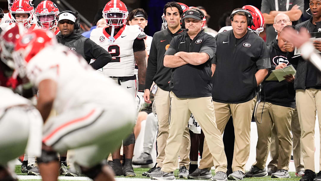 Dec 6, 2025; Atlanta, GA, USA; Georgia Bulldogs head coach Kirby Smart looks on during the first quarter against the Alabama Crimson Tide during the 2025 SEC Championship game at Mercedes-Benz Stadium. Mandatory Credit: Dale Zanine-Imagn Images