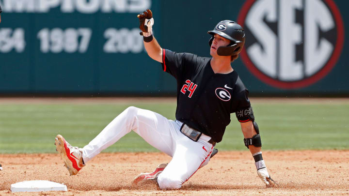 Georgia's Charlie Condon (24) slides into second base during a NCAA Athens Regional baseball game against Army in Athens, Ga., on Friday, May 31, 2024. Georgia won 8-7.