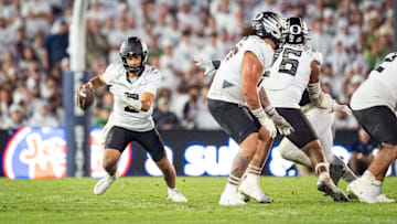Oregon quarterback Dante Moore scrambles with the ball as the Oregon Ducks face the Penn State Nittany Lions on Sept. 27, 2025, at Beaver Stadium in University Park, Pennsylvania.