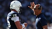 Aug 30, 2025; University Park, Pennsylvania, USA; Penn State Nittany Lions head coach James Franklin talks with quarterback Drew Allar (15) during the first quarter against the Nevada Wolf Pack at Beaver Stadium. Mandatory Credit: Matthew O'Haren-Imagn Images