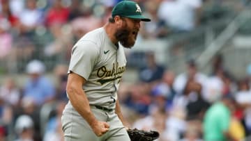 Jun 1, 2024; Atlanta, Georgia, USA; Oakland Athletics relief pitcher Austin Adams (29) reacts after a strikeout against the Atlanta Braves in the eighth inning at Truist Park. Mandatory Credit: Brett Davis-USA TODAY Sports
