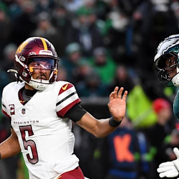 Washington Commanders quarterback Jayden Daniels looks to pass the ball against the Philadelphia Eagles.