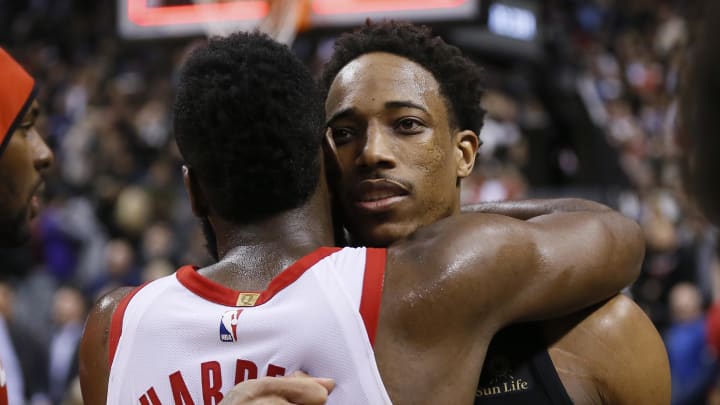 Mar 9, 2018; Toronto, Ontario, CAN; Houston Rockets guard James Harden (13) and Toronto Raptors guard DeMar DeRozan (10) embrace at the end of the game at the Air Canada Centre. Toronto defeated Houston 108-105. Mandatory Credit: John E. Sokolowski-USA TODAY Sports