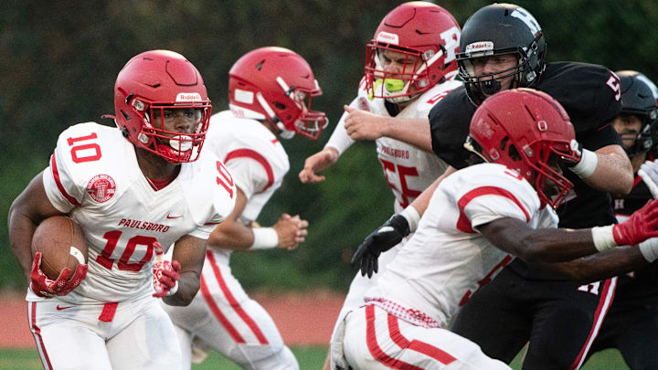 Paulsboro's Javion Payne runs the ball during the football game between Paulsboro and Haddonfield played at Haddonfield High School on Friday, September 1, 2023. Paulsboro's Javion Payne runs the ball during the football game between Paulsboro and Haddonfield played at Haddonfield High School on Friday, September 1, 2023.