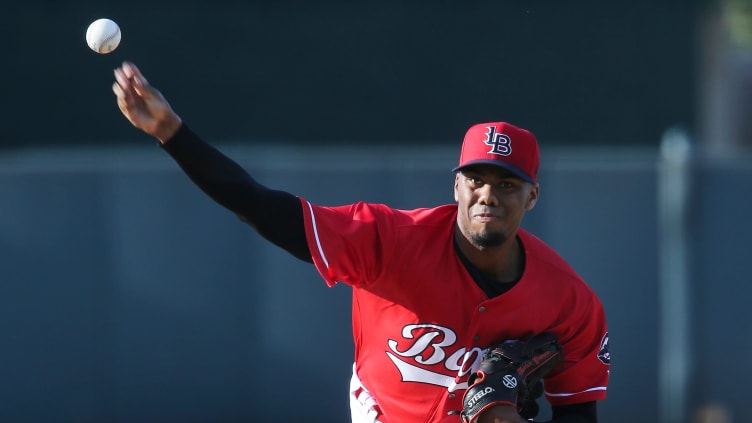 Louisville Bats' Hunter Greene (3) delivers a pitch. Greene is the Reds top pitching prospect.