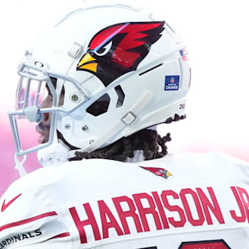 Dec 15, 2024; Glendale, Arizona, USA; Arizona Cardinals wide receiver Marvin Harrison Jr. (18) warms up before the game against the New England Patriots at State Farm Stadium. Mandatory Credit: Joe Camporeale-Imagn Images