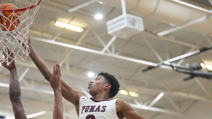 Perry Pumas forward Bruce Branch III (3) shoots the ball over Hamilton Huskies guard Davion Harris (2) at Perry High School in Gilbert on Dec. 18, 2024.