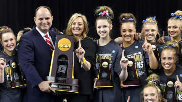 Apr 20, 2019; Fort Worth, TX, USA; University of Oklahoma gymnast Maggie Nichols celebrates winning the NCAA national championship with her teammates during the NCAA Nationals at Fort Worth Convention Center. Mandatory Credit: Jerome Miron-USA TODAY Sports