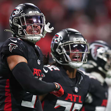 Sep 22, 2024; Atlanta, Georgia, USA; Atlanta Falcons safety Justin Simmons (31) celebrates after an interception against the Kansas City Chiefs in the first quarter at Mercedes-Benz Stadium. Mandatory Credit: Brett Davis-Imagn Images