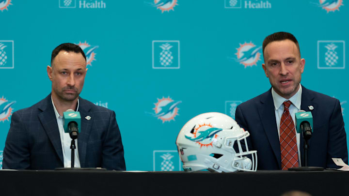 Miami Dolphins head coach Jeff Hafley, right, joined by general manager Jon-Eric Sullivan, left