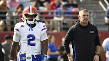 Nov 2, 2024; Jacksonville, Florida, USA; Florida Gators head coach Billy Napier and quarterback DJ Lagway (2) before a game against the Georgia Bulldogs at EverBank Stadium. Mandatory Credit: Melina Myers-Imagn Images