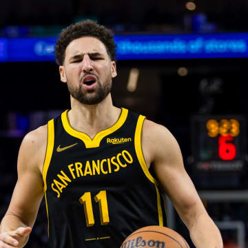 Dec 19, 2023; San Francisco, California, USA; Golden State Warriors guard Klay Thompson (11) reacts after he is called for a foul against the Boston Celtics during the second half at Chase Center. Mandatory Credit: John Hefti-USA TODAY Sports