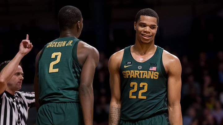 Feb 13, 2018; Minneapolis, MN, USA; Michigan State Spartans forward Jaren Jackson Jr. (2) and guard Miles Bridges (22) react after a foul in the first half against the Minnesota Gophers at Williams Arena. Mandatory Credit: Brad Rempel-USA TODAY Sports