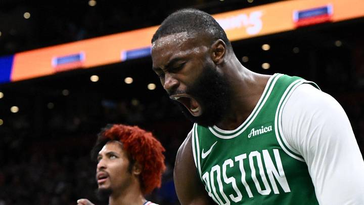 Apr 21, 2026; Boston, Massachusetts, USA; Boston Celtics guard Jaylen Brown (7) reacts after being folded by Philadelphia 76ers guard Kelly Oubre Jr. (9) in the second half of a game two of the first round of the 2026 NBA Playoffs at TD Garden. Mandatory Credit: Brian Fluharty-Imagn Images
