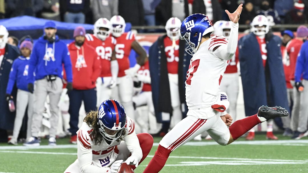 Dec 1, 2025; Foxborough, Massachusetts, USA; New York Giants place kicker Younghoe Koo (37) makes an extra point during the second quarter against the New England Patriots at Gillette Stadium. Mandatory Credit: Eric Canha-Imagn Images