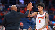Nov 18, 2025; Syracuse, New York, USA; Syracuse Orange head coach Adrian Autry (left) greets forward Sadiq White Jr. (0) after fouling out of the game against the Monmouth Hawks during the second half at the JMA Wireless Dome. Mandatory Credit: Rich Barnes-Imagn Images